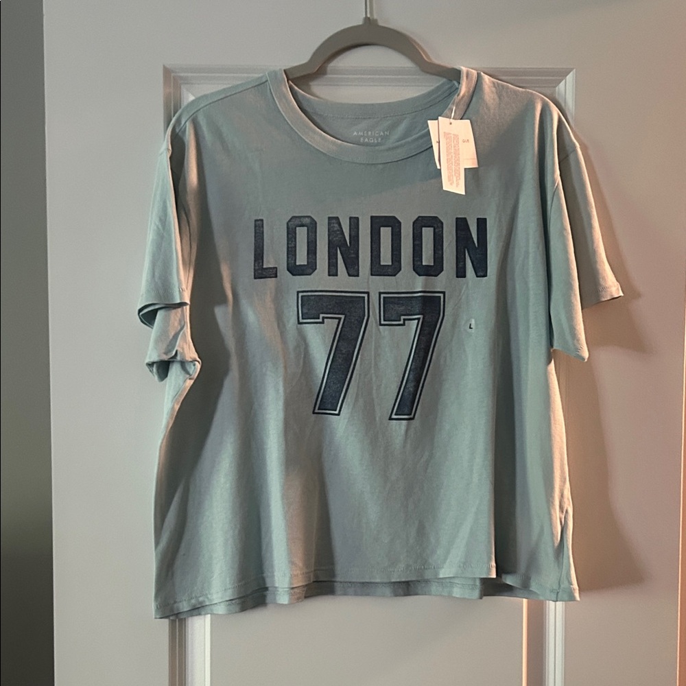AE Ex-Boyfriend Destination Graphic Cropped T-
Shirt